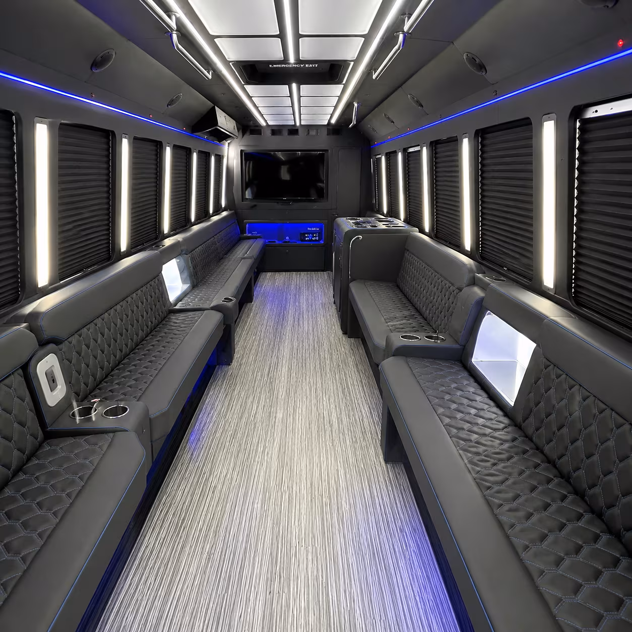 Friends laughing during a party bus celebration in Kansas City
